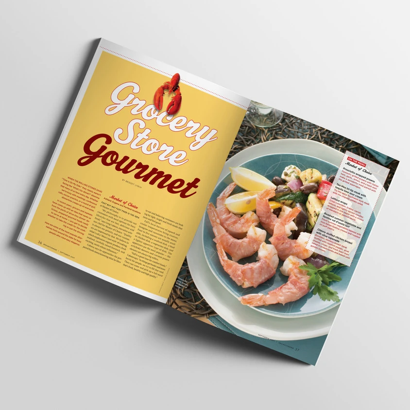 Yellow and orange magazine spread with lobster and seafood